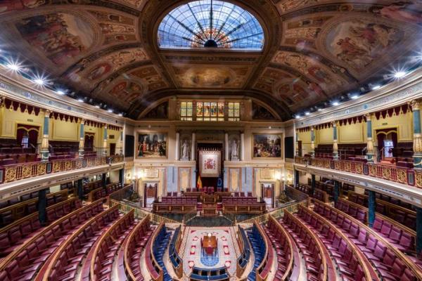 Empty seats of Spanish parliament's lower house in Madrid, Spain, Wednesday, June 14, 2023. Spain's general election Sunday, July 23 could make the country the latest European Union member to shift to the political right. Most polls put the right-wing Popular Party ahead of the Socialists but likely needing the support of the extreme right Vox party to form a government. (AP Photo/Bernat Armangue)