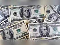 Dollar slides on Fed cut bets; kiwi jumps after RBNZ strikes hawkish tone