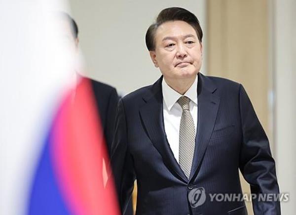 President Yoon Suk Yeol arrives at a Cabinet meeting at the presidential office in Seoul on Feb. 20, 2024. (Yonhap)