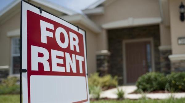 For Rent sign in front of new house