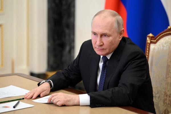 MI6 Chief Richard Moore invited more Russians to work with U.K. intelligence services.