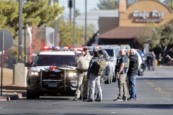 Law enforcement officers gather near Greenspun Hall on the University of Nevada, Las Vegas, campus after reports of an active shooter, Wednesday, Dec. 6, 2023, in Las Vegas. Picture: Steve Marcus/Las Vegas Sun via AP